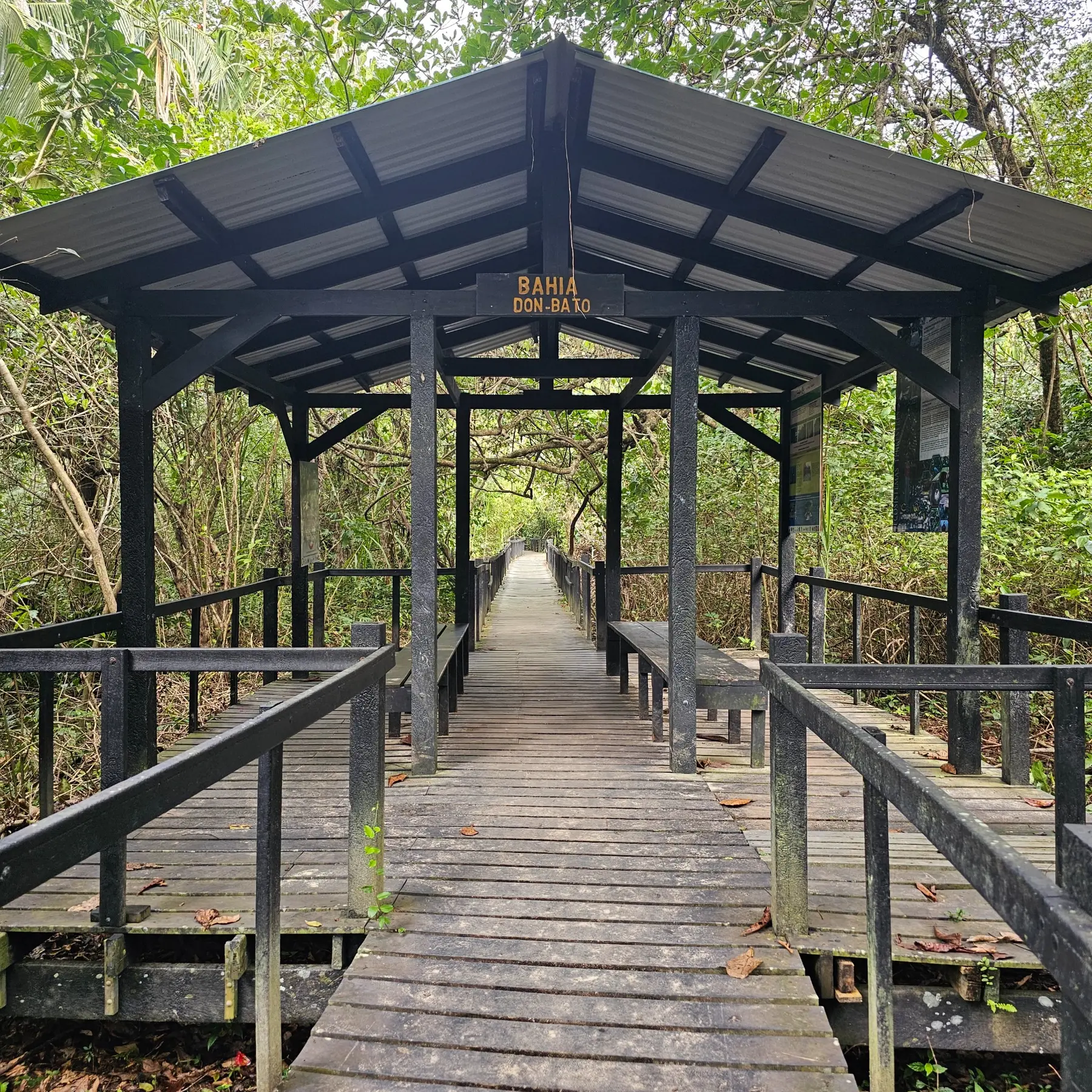 Wooden boardwalk and shelter in Cahuita National Park